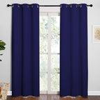 NICETOWN Window Treatment Energy Saving Thermal Insulated Solid Grommet Blackout Curtains/Drapes for Living Room (Royal Blue, 1 Pair, 42 by 84-Inch)