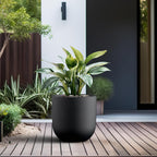 Kante 11.0" Round Concrete Planter, Large Cylinder Plant Pot with Curved Bottom and Drainage Hole, for Indoor and Outdoor Use – Garden or Patio, Black Finish with Warm Brown Interior